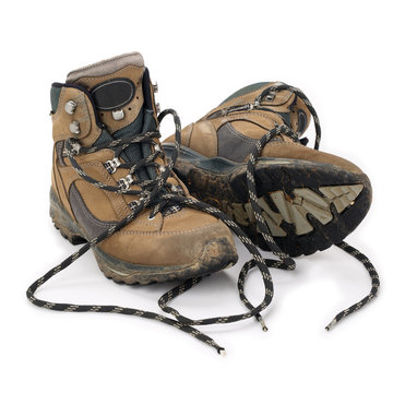 Used Hiking Boots Isolated On White Background