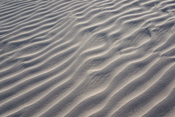 A pattern of white sand