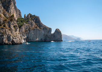  Boats with tourists near Grotta Bianca and Grotta Meravigliosa, Capri, Italy