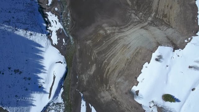Stunning Drone footage over the mountains and  l.ake Hongrin in Vaud, Switzerland. The reservoir  is located in the municipalities of Ch&acirc;teau-d'&OElig;x and Ormont-Dessous. 