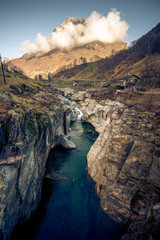 a landscape shot with a small stream in ticino italy
