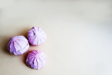Pink marshmallows and  half marshmallow . Copy space, candid.