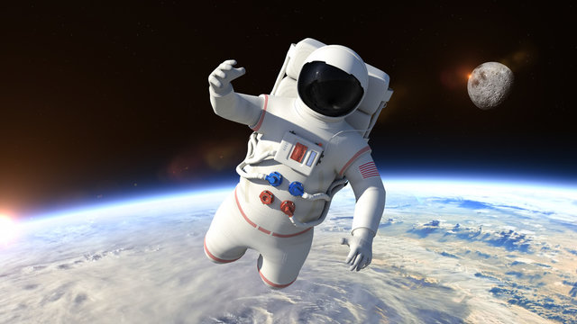 Astronaut is flying over the planet Earth and slowly closing. Astronaut pushing the boundaries of exploration.