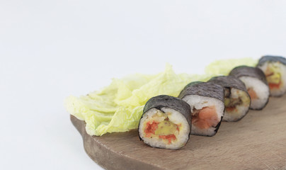 sushi rolls on a cutting Board.isolated on white