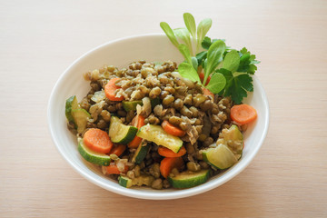 Mung beans and zucchini in vegetable risotto. Lean cuisine.

