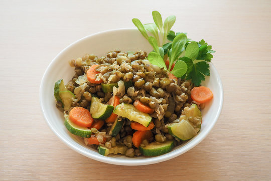 Mung beans and zucchini in vegetable risotto. Lean cuisine.
