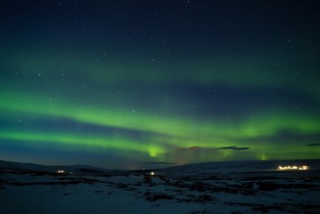 Aurora borealis on a mountain near the Godafoss in Iceland 2