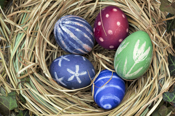 Nest of natural-colored Easter eggs