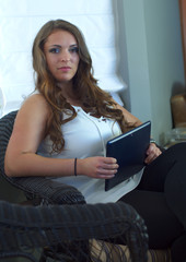 young businesswoman holding pad tablet internet display
