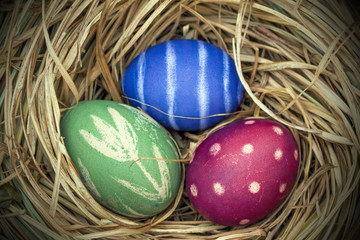 Nest of natural-colored Easter eggs