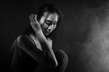 broken heart lonely girl can cry, smoke Fog on dark Background