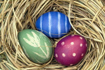 Nest of natural-colored Easter eggs
