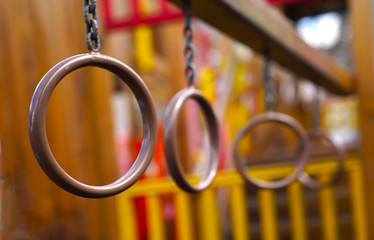 Iron ring chain for exercise climbing on blurred children playground