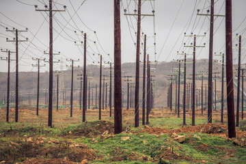 powerlines crossing a field in Ptolemaidaa greece