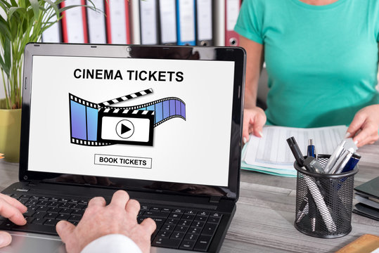 Online cinema tickets booking concept on a laptop