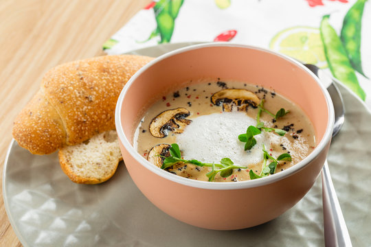 Mushroom cream soup and champignon in bowl
