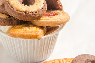 assorted cookies on wooden tray