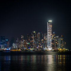 city skyline at night - modern skyscraper cityscape at night