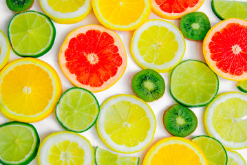 Food background. Fresh citrus fruits in a cut. Fruit pattern. 