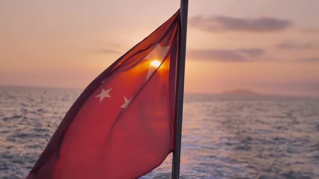 Chinese red flag flutters in wind
