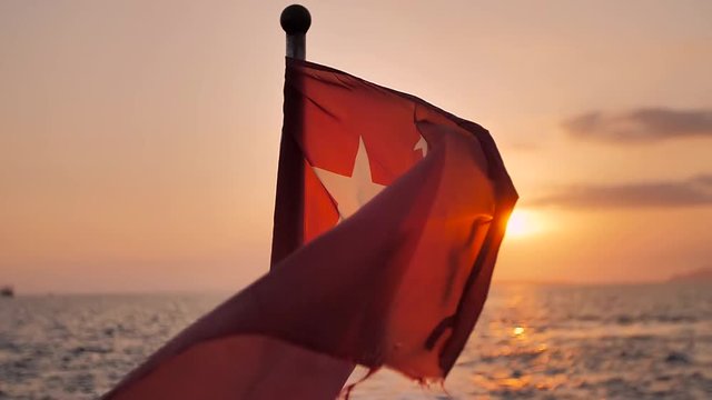 Chinese red flag flutters in wind