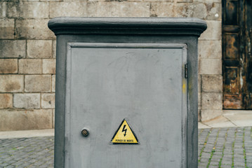 Gray electric box on street