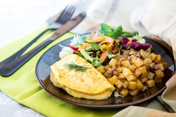 French Omelette with Potatoes, Mushroom and Salad