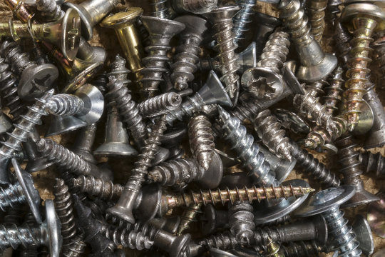 Pile Of Loose Assorted Sizes Screws. Macro Of Pile Of Screws