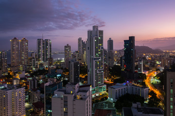 Panama City skyline at night - Modern skyscrapers with sunset sky