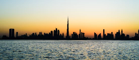 Foto op Canvas Panoramisch uitzicht over Dubai bij zonsondergang © creativefamily