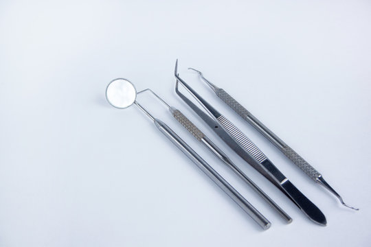 Group of dental tools for the treatment of teeth.