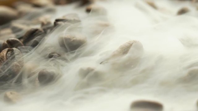 Fried coffee beans, delicious aroma, covered with smoke, roasted grain cafe flavor taste hot fresh smell morning 