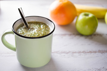  Healthy eating. Green apple, parsley, banana ,green smoothies , measuring tape. Dieting, slimming, weight loss and meal planning concept. Place for text