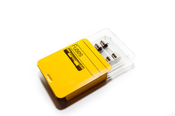 Electrical fuse for protection component in yellow package, it breaks or cut the circuit out when...