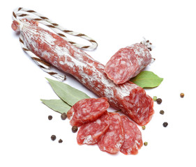 Dried organic salami sausage on white background