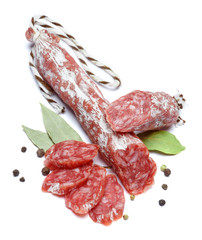 Dried organic salami sausage on white background