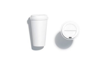 Blank white disposable paper cup mock up lying and stand top view with plastic lid mockup isolated, 3d rendering. Empty coffee drinking mug mockup. Clear plain tea take away package