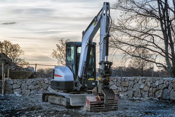 Quarry aggregate with heavy duty machinery. Construction industry.