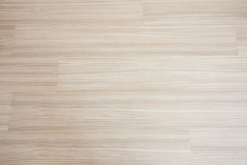 Closeup of the wooden texture on the laminate floor.