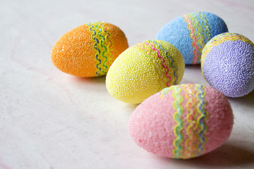 Easter eggs on a table. Beautiful easter background. Homemade holiday decor.	