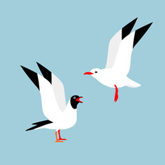 Two beautiful birds on a blue background.