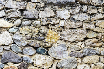 Colorful pattern of decorative brown grey  stone wall surface, background, texture, pattern