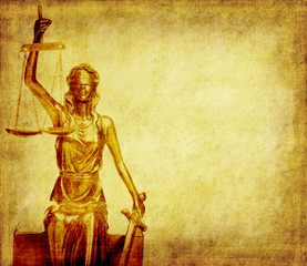 Fototapeta na wymiar Statue of justice on old paper background, law concept