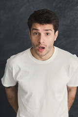 Obraz premium Shocked young man portrait