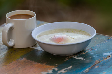 easy fast food cooking a simple egg porridge and hot coffee for breakfast