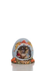 Isolated and decorative easter sculpture with a rabbit family