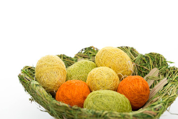 Decorative and isolated easter basket with eggs