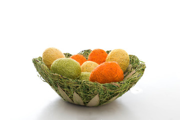 Decorative and isolated easter basket with eggs