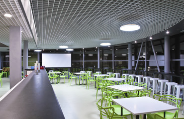 Empty table and chair in canteen, cafeteria interior