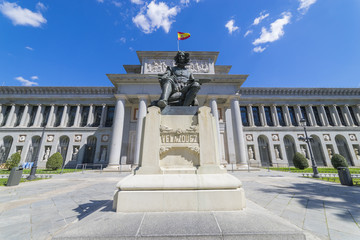 Main facade of the Prado Museum, old art gallery in Spain, Madrid. Sculpture by the painter...